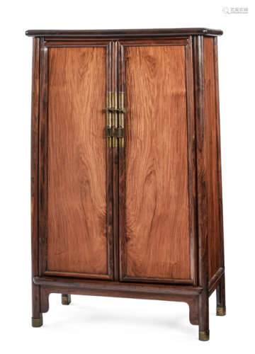 A TAPERED HARDWOOD CABINET
