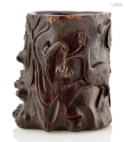 A CARVED AND LACQUERED WOOD BRUSHPOT WITH DEER AND FLOWERS