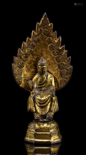 A GILT-BRONZE FIGURE OF BUDDHA SHAKYAMUNI