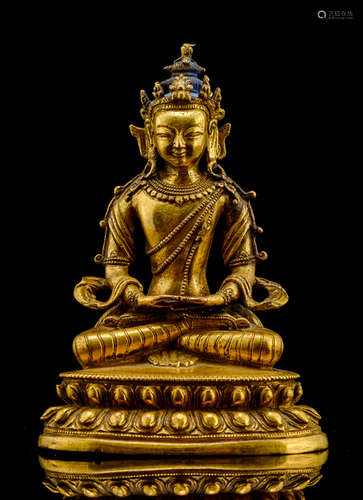 A GILT-BRONZE FIGURE OF AMITAYUS