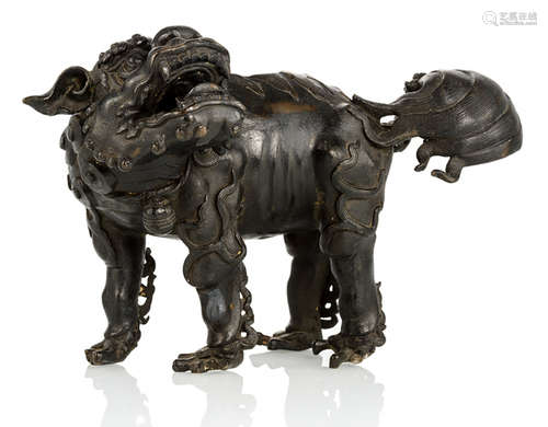 A BRONZE CENSER IN THE SHAPE OF A LION