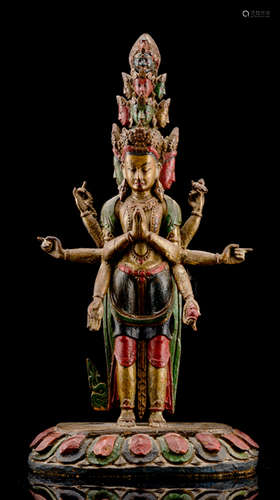 A POLYCHROME WOOD FIGURE OF EKADASHALOKESHVARA