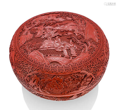 A LARGE CARVED CINNABAR LACQUER BOX AND COVER