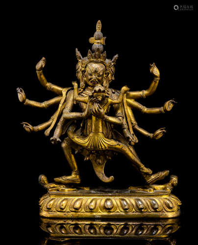 A GILT-BRONZE FIGURE OF A DIVINITY