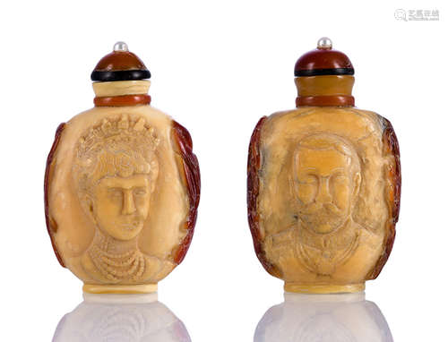 A PAIR OF CARVED HONRBILL SNUFF BOTTLES DEPICTING PORTRAITS OF QUEEN VICTORIA AND PRINCE ALBERT