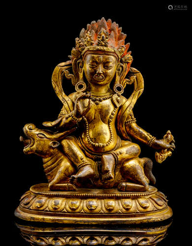 A GILT-BRONZE FIGURE OF A LOCAL DIVINITY