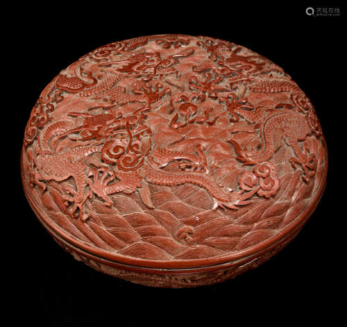 A FINE CARVED CINNABAR LACQUER BOX AND COVER WITH FOUR FIVE-CLAWED DRAGONS