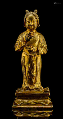 A GILT-BRONZE FIGURE OF A TAOIST IMMORTAL