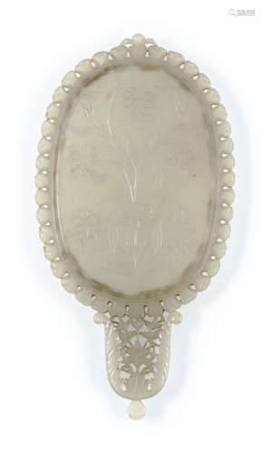 A FINE AND VERY RARE JADE MIRROR HOLDER IN MUGHAL STYLE