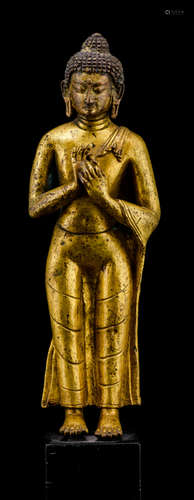 A GILT-BRONZE FIGURE OF BUDDHA SHAKYAMUNI