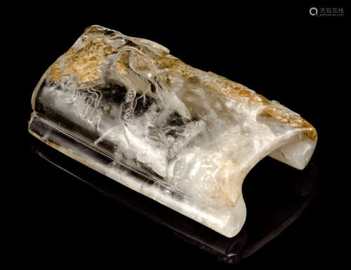 A CARVED ROCK CRYSTAL WRIST REST WITH SCOLAR AND PINE