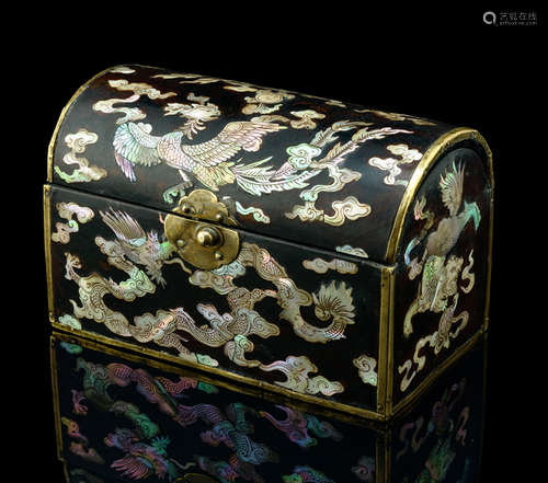 A RARE MOTHER-OF-PEARL-INLAID LACQUERED WOOD BOX AND COVER IN SHAPE OF A TRUNK