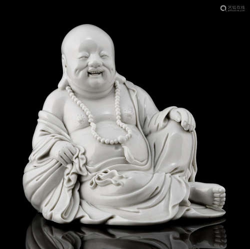 A DEHUA FIGURE OF BUDAI