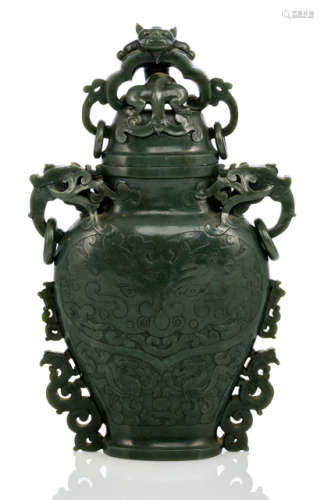 A SPINACH-GREEN JADE VASE AND COVER IN ARCHAIC STYLE