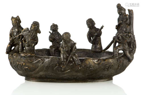 A BRONZE VESSEL DECORATED WITH SEVEN OF THE EIGHT IMMORTALS IN A BOAT