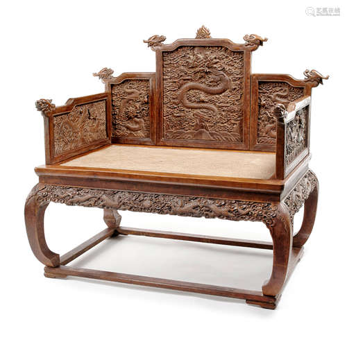 A WELL CARVED HARDWOOD THRONE CHAIR WITH DRAGONS