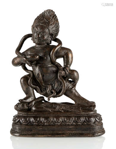 A BRONZE FIGURE OF JAMBHALA