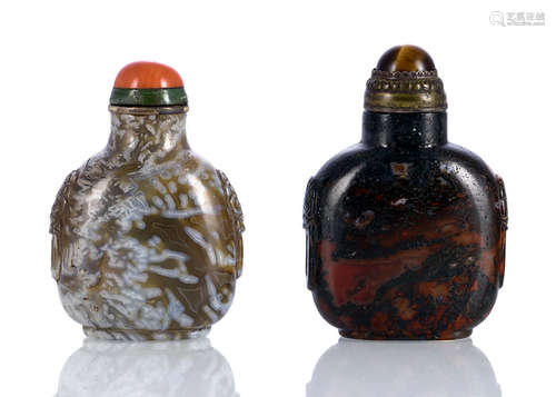 TWO MARBELED AGATE SNUFF BOTTLES WITH CARVED MASK-AND-RING HANDLES