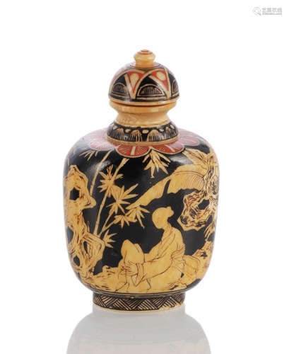 A BLACK AND RED-PAINTED IVORY SNUFFBOTTLE