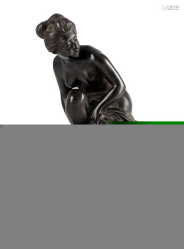 A BRONZE FIGURE OF A YOUNG WOMAN