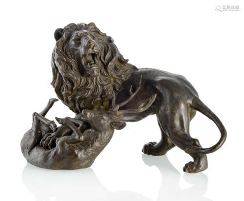 A BRONZE GROUP OF A LION AND A DEER