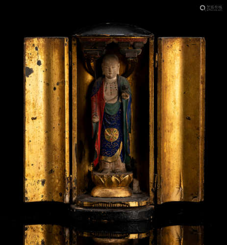 A LACQUERED AND PART-GILT WOOD SHRINE WITH POLYCHROME PAINTED FIGURE OF JIZO