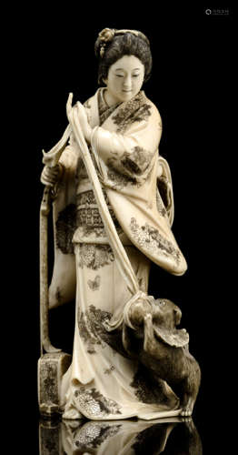 A FINE IVORY OF A STANDING LADY WITH BIWA AND PLAYING DOG