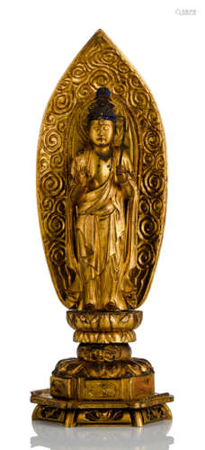 A GILT-LACQUERED WOOD FIGURE OF SEISHI BOSATSU ON A LOTOS IN FRONT OF A MANDORLA