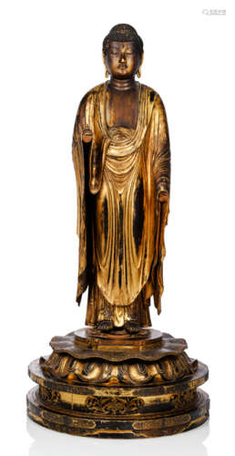 A GILT- AND BLACK LACQUERED WOOD SCULPTURE OF BUDDHA AMIDA