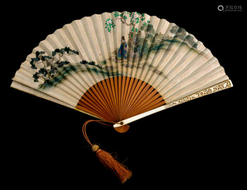 A METICULOUSLY PAINTED FOLDING FAN WITH CARVED IVORY COVERS