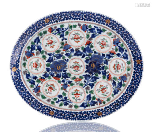 AN IMARI PORCELAIN PLATE FOR NINE SPICE CONTAINERS