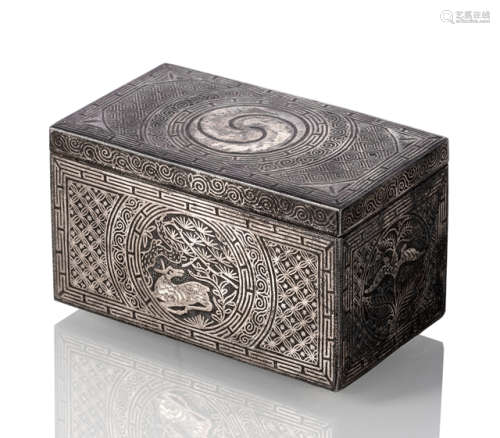 A SILVER-INLAID IRON BOX