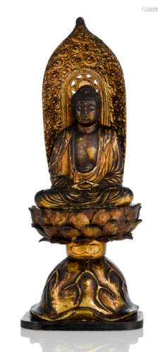 A GILT-LACQUERED WOOD FIGURE OF AMIDA SEATED ON A LOTOS THRONE