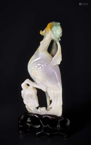 A JADEITE SCULPTURE OF A PHEONIX WITH PEONY, 1900s