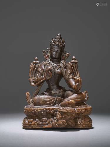 AN EXTREMELY RARE 17th CENTURY RHINOCEROS HORN CARVING OF A GREEN TARA