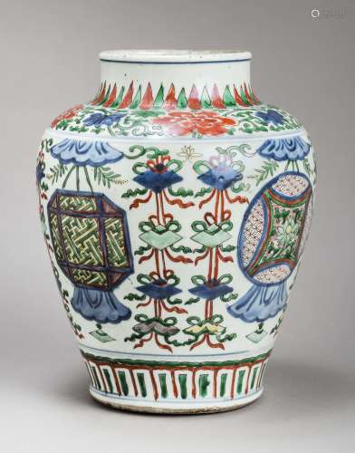A TRANSITIONAL WUCAI OVIFORM VASE WITH CANOPIES AND BANNERS, 17th CENTURY