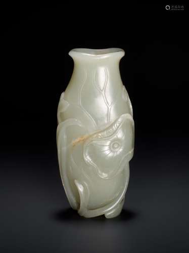 AN 18TH CENTURY CELADON AND RUSSET JADE LOTUS VASE