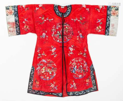 A BRIGHT RED SILK LADY’S ROBE WITH ‘CHINESE LEGENDS’, 1920s