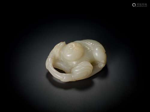 AN 18TH CENTURY JADE ‘BOY AND LOTUS’ CARVING
