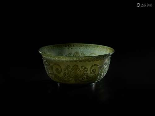 A TRANSLUCENT SPINACH GREEN MUGHAL STYLE ‘LOTUS’ JADE BOWL, QING DYNASTY
