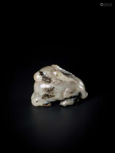 A MING DYNASTY MOTTLED JADE CARVING OF A RAM WITH LINGZHI
