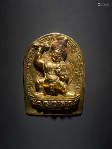 A SMALL INSCRIBED GILT-BRONZE STELE OF MAHAKALA