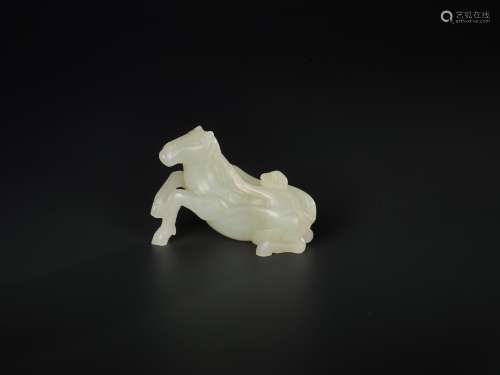 A PALE CELADON 'HORSE AND MONKEY' JADE CARVING, QING DYNASTY, 18TH / 19TH CENTURY