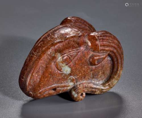 AN EXCEPTIONAL HAN PERIOD RAM’S HEAD CARVED IN THE ROUND IN JASPER-LIKE JADE