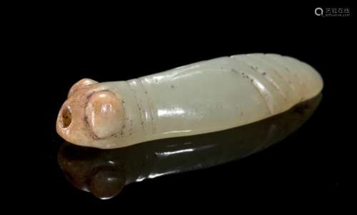 A TINY, HIGHLY POLISHED LATE SHANG CICADA WITH BULGING EYES CARVED IN LIGHT GREEN JADE