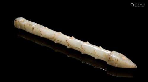A SOPHISTICATED HANDLE-SHAPED OBJECT IN WHITE JADE DECORATED WITH LEAF PATTERNS