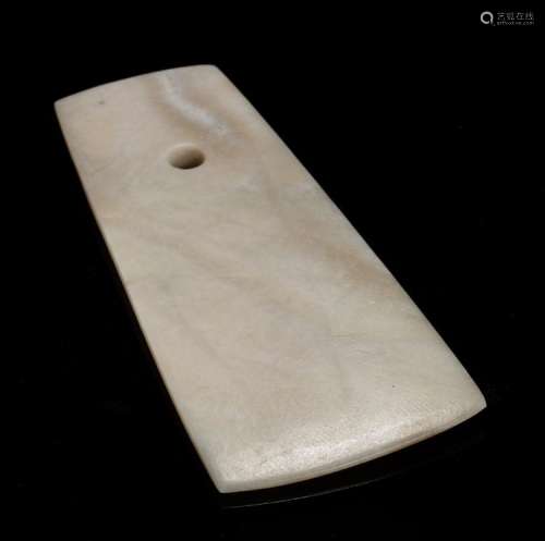 A SMOOTH AND ATTRACTIVE QIJIA CULTURE BLADE OF TRAPEZOIDAL FORM IN WHITE JADE