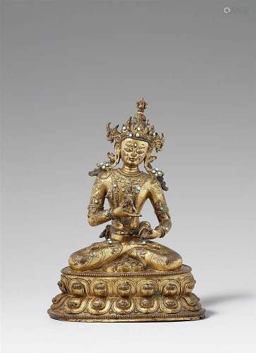 A magnificent Tibetan gilt bronze figure of Vajrasattva. 17th century