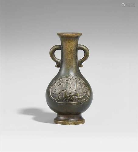 A pear-shaped bronze vase for incense tools. 17th century