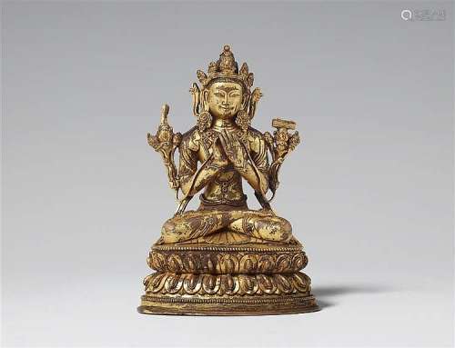 A Tibetan gilt bronze figure of Manjushri. 17th/18th century